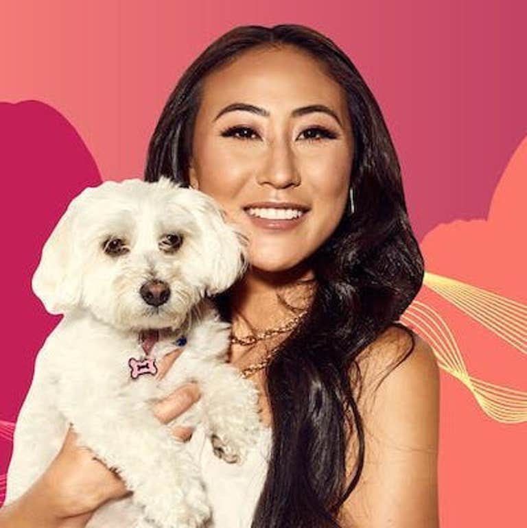 Lizzy Capri holding dog on pink to purple gradient background Passionfruit Remix