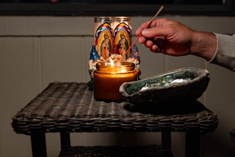 rgb panel pro 2.0 review - photo of man lighting incense in a candle 