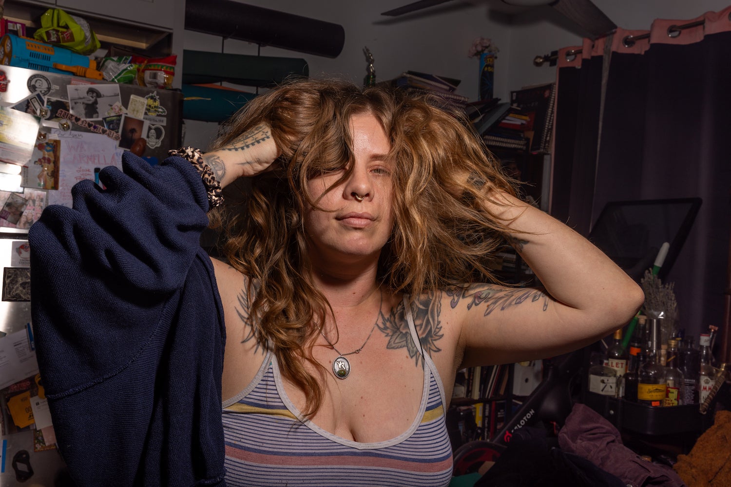 elinchrom three review - a woman with her hands in her hair 