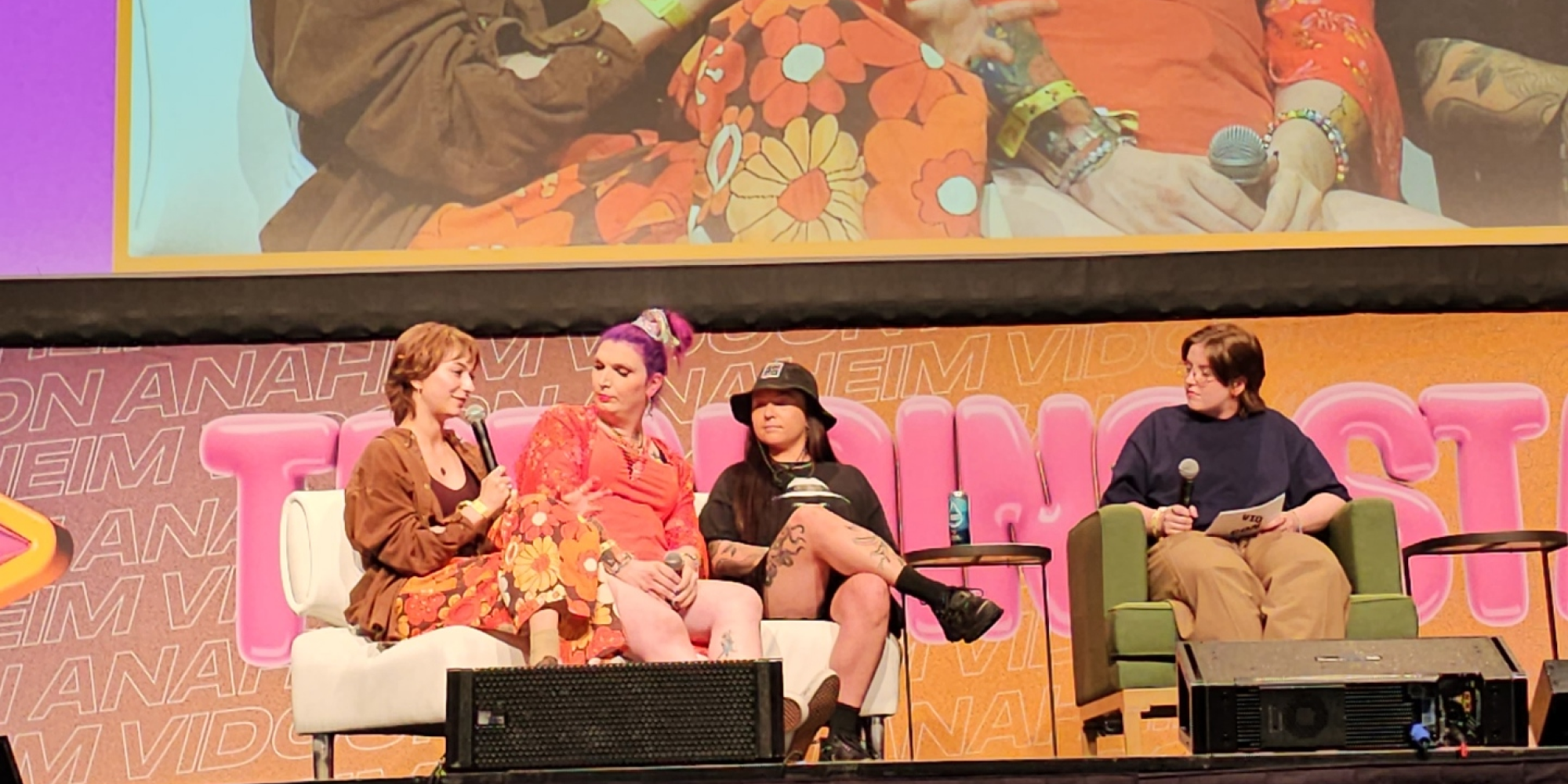creators soupytime, mercury stardust, and lindsay nikole speaking on panel next to moderator grace stanley