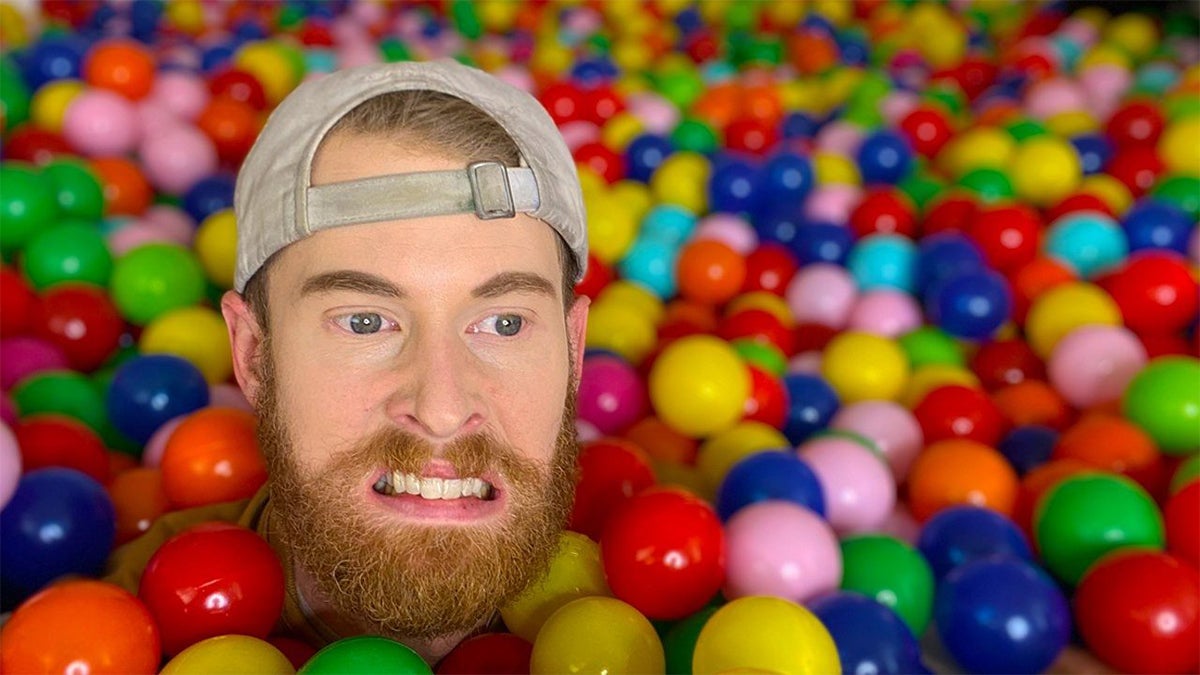 brandon farris in a ball pit
