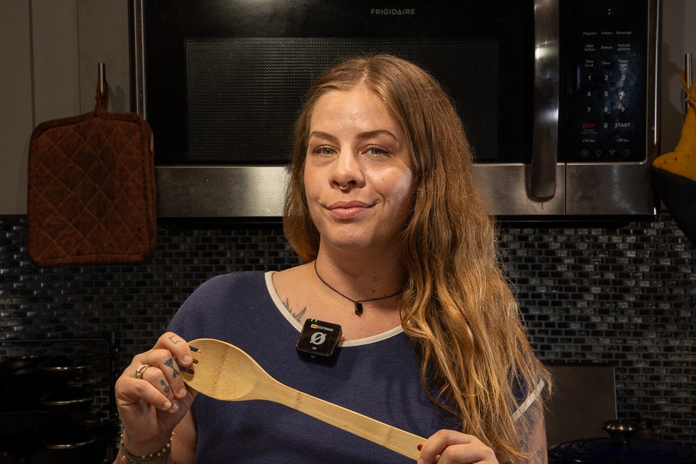 rode wireless me mic - tattoo artist Emily Effler showing what the wireless me looks like without the windscreen