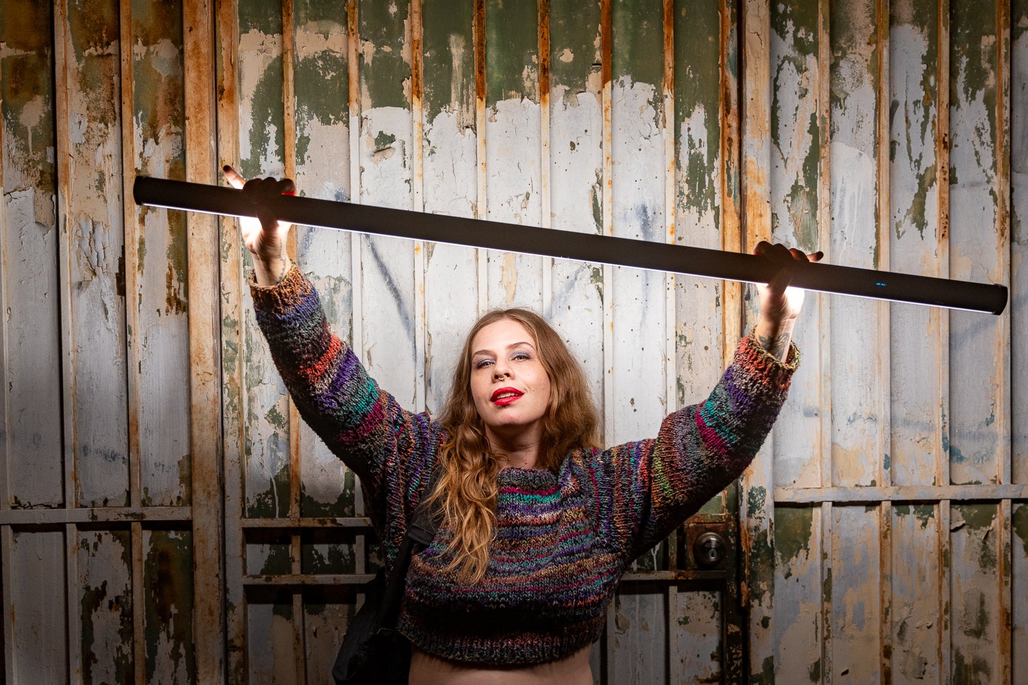lume cube rgb xl tube light held by model emily effler