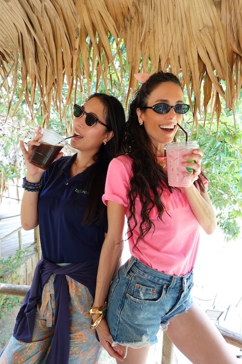 free trip - liz plank enjoying a beverage on vacation
