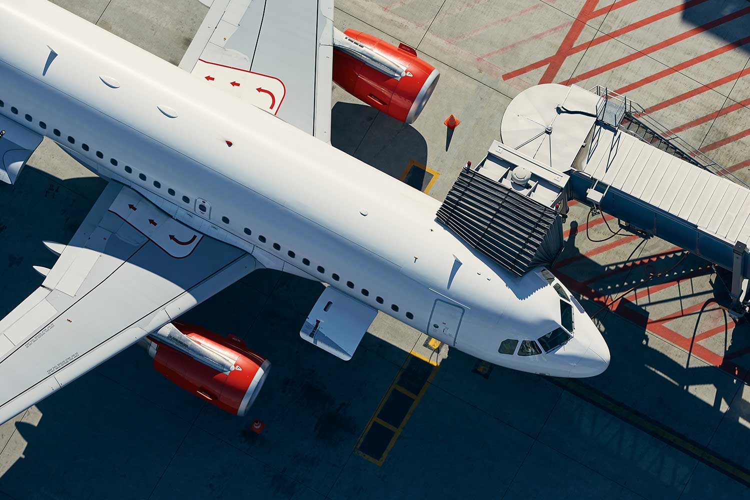 overhead view airplane at gate