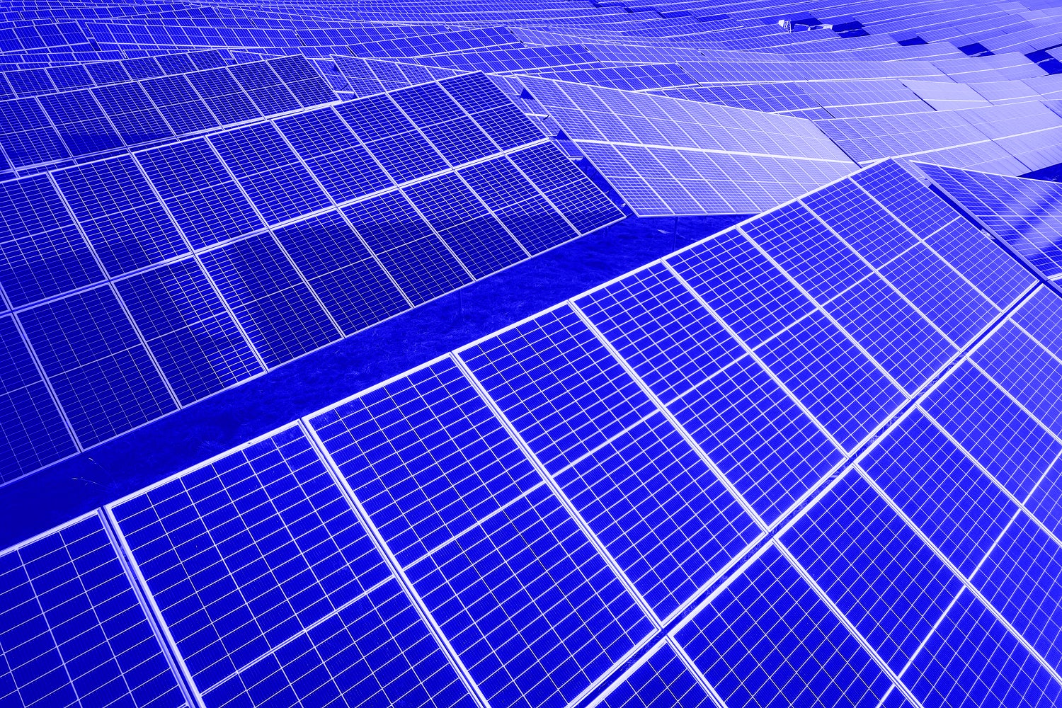 Aerial view of photovoltaic solar panels and large solar farm in Maine