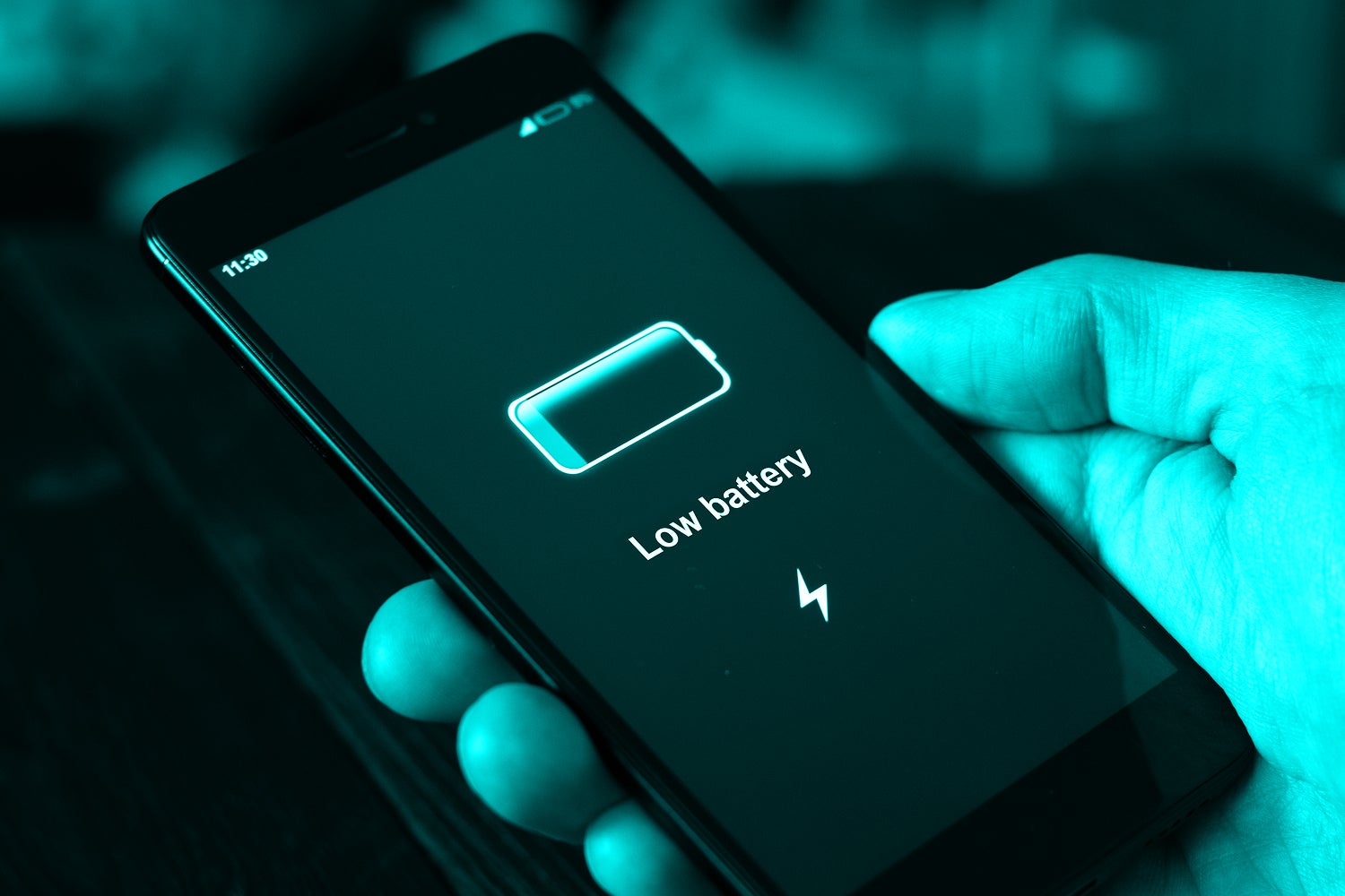 phone with low battery indicator on screen